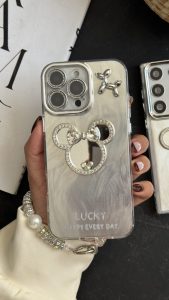 قاب موبایل ( آیفون - سامسونگ ) میکی اسکوییکی داگ آیینه ای نگین دار + بندست