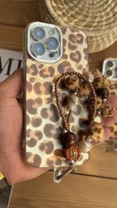 قاب موبایل آیفون چشم پلنگی شاینی + بندست - تصویر 3