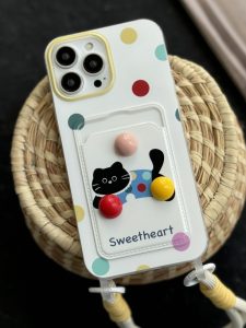 قاب موبایل آیفون گربه خوش قلب توپی جاکارتی بنددار