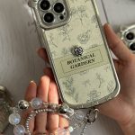 قاب موبایل آیفون باغ سلطنتی + بند ست مروارید